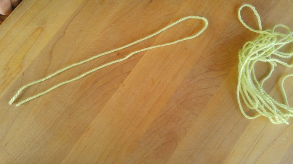 An example of a piece of yarn folded in half.