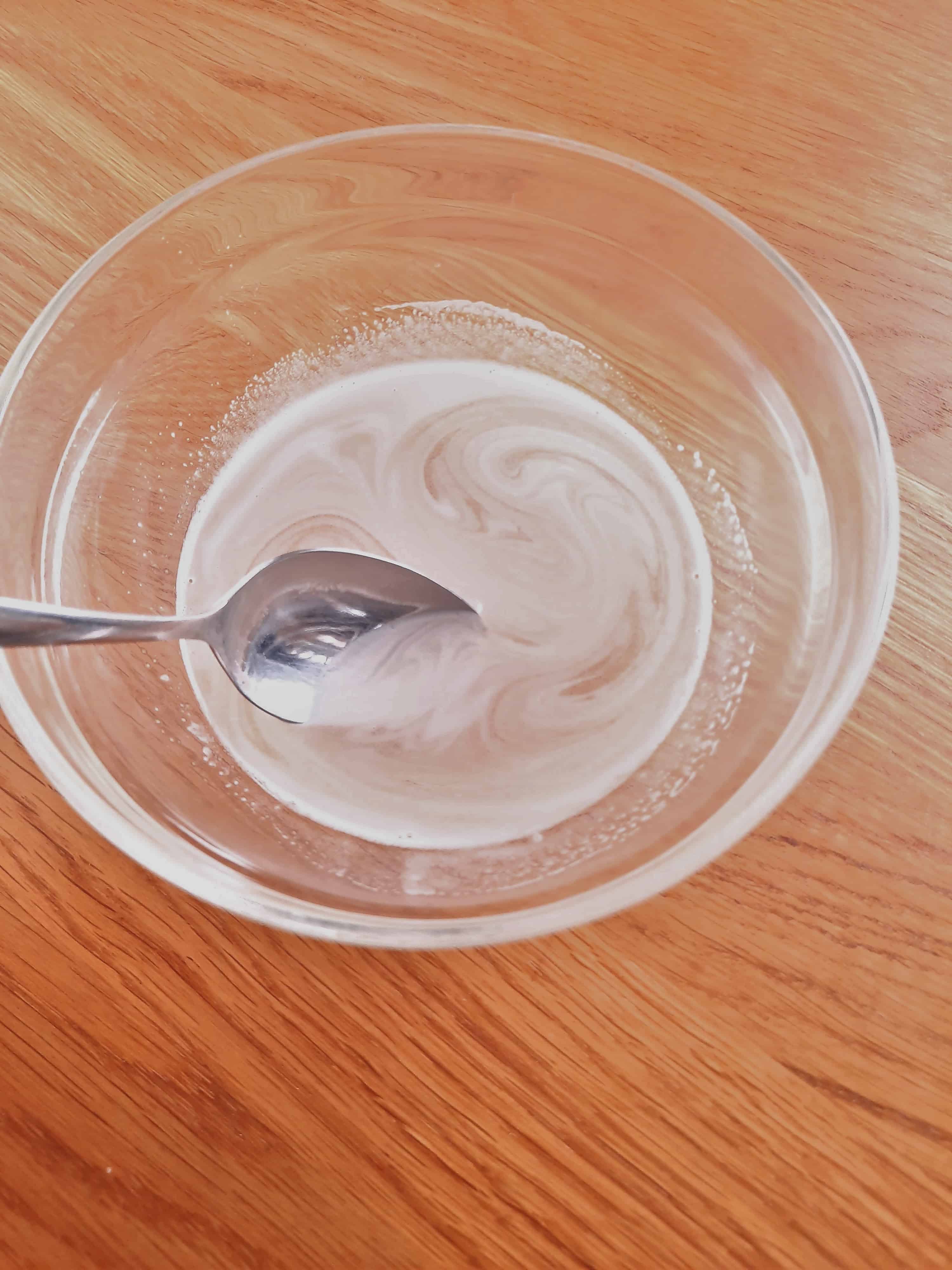 liquid gelatin dissolved in water in a small clear bowl