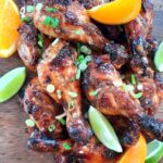 platter of asian citrus drumsticks with sticky sweet sauce