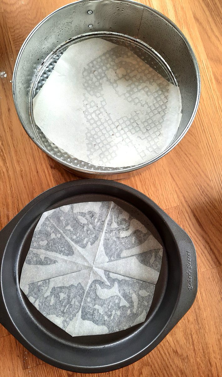 two round pans lined with parchment paper