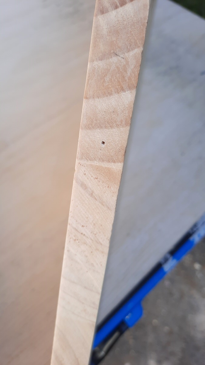 nail hole in a board