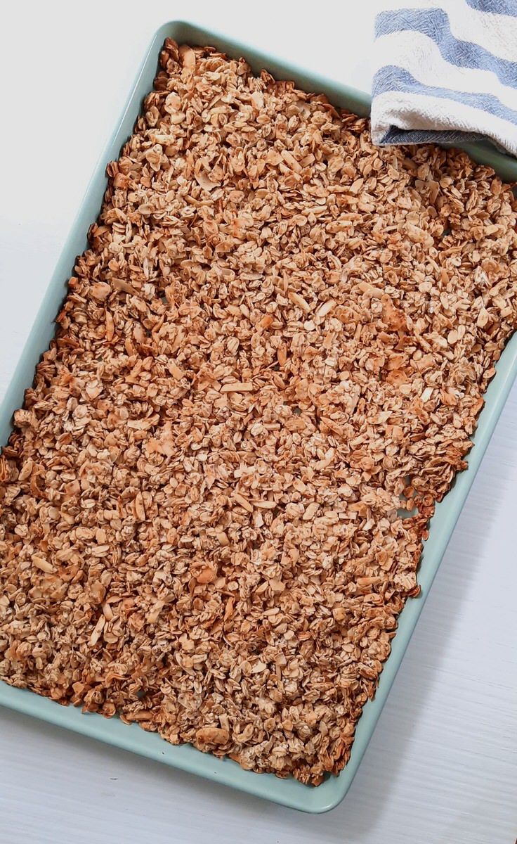 cooked granola on a baking sheet