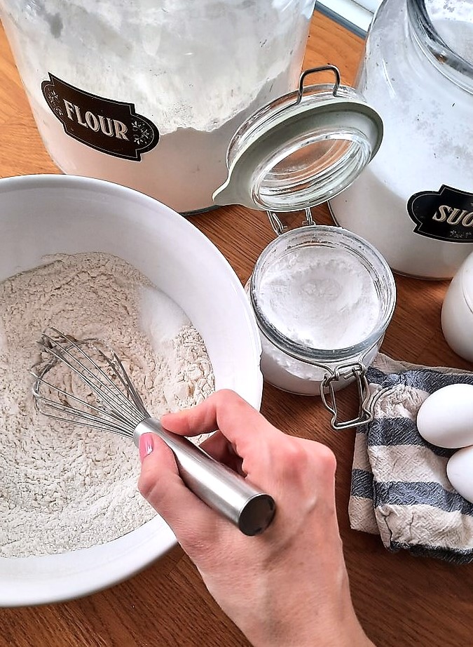 whisking together dry ingredients of coffee cake