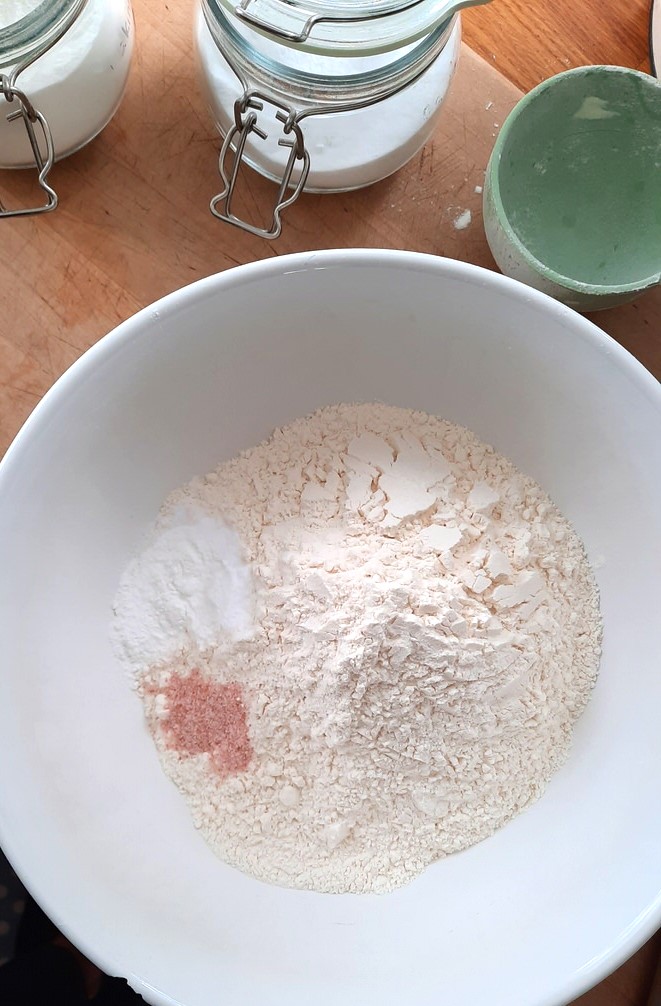 dry ingredients for Irish soda bread in a white mixing bowl