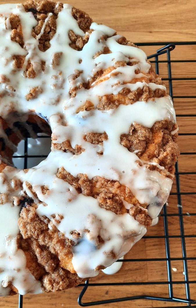 top shot of a freshly glazed coffee cake