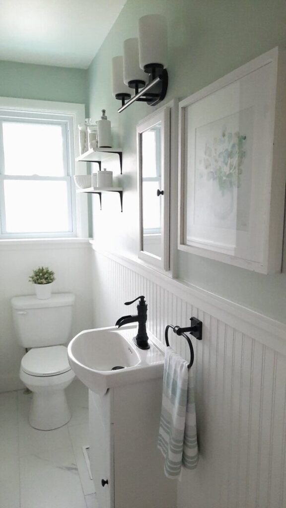 small bathroom makeover before picture of soft and airy bathroom